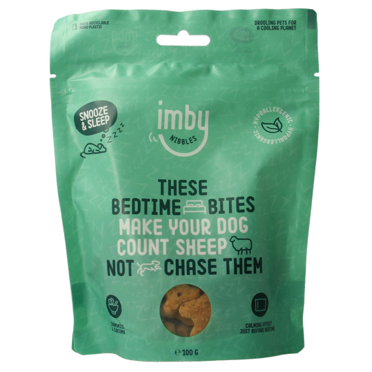 Imby Pet Food vegan dog treat biscuits in a 100g package, made with plant-based ingredients for dogs.