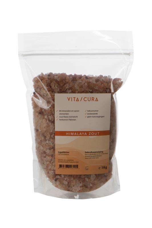 Vitacura Himalaya zout bad en douche product in 1 kg container, showing pink Himalayan salt crystals for bath and shower use.
