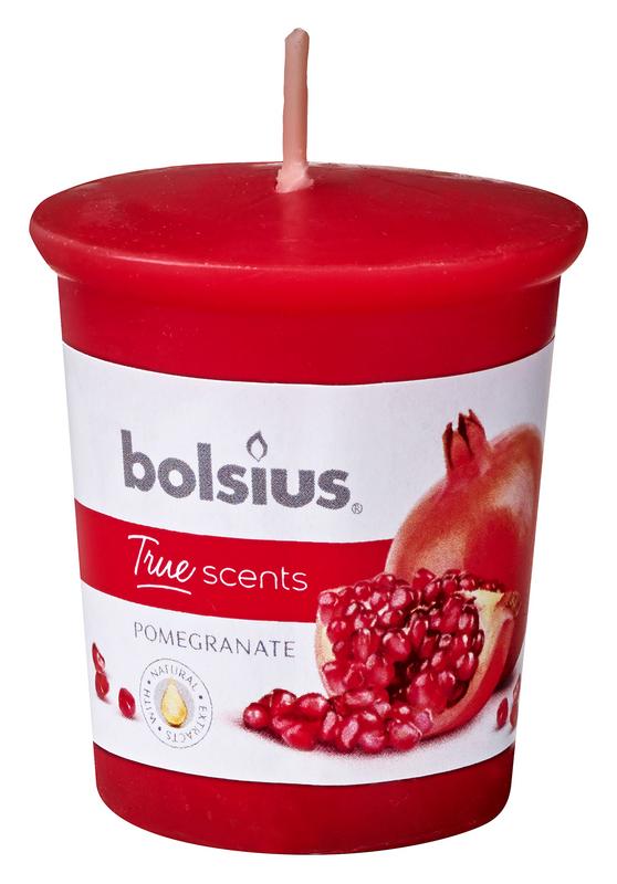 Bolsius True Scents pomegranate candle in a glass holder, scented candle for home ambiance.