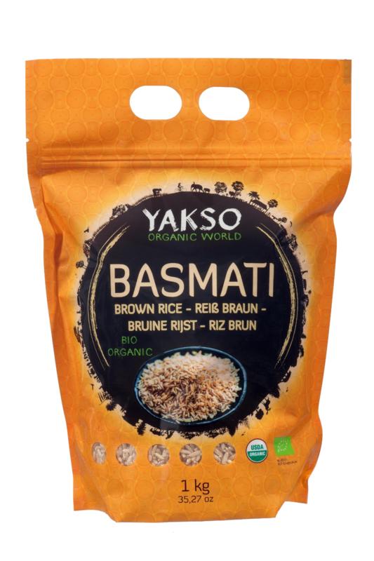 Organic Yakso Basmati brown rice in 1kg packaging, showing a clear view of the rice grains in a natural setting.