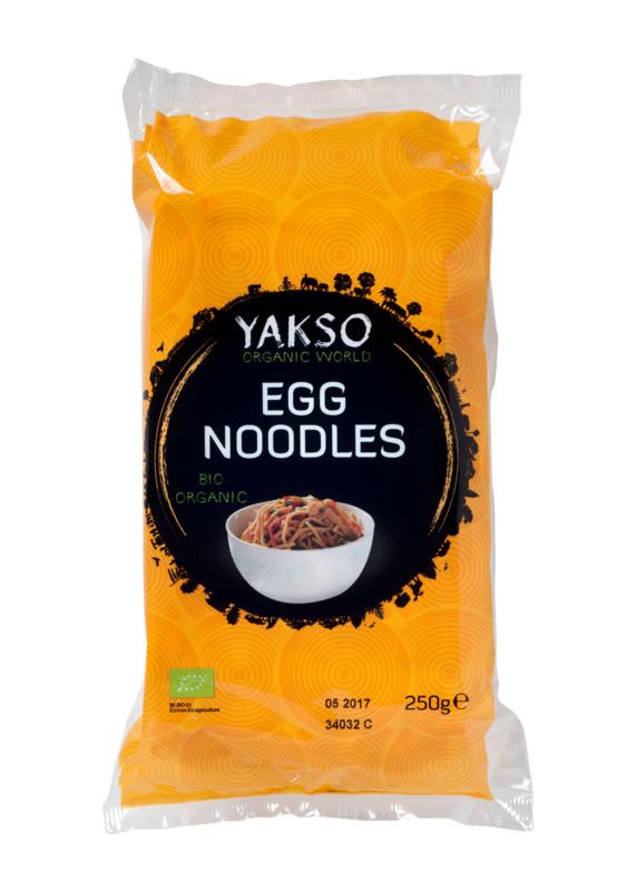 Organic Yakso Eiermie pasta and rice product in 250g package, featuring cooked noodles and rice grains.