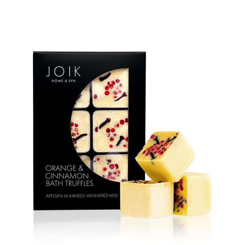 Joik Organics orange and cinnamon bath and shower truffles, 258g, with vibrant orange and cinnamon ingredients visible, natural skincare.