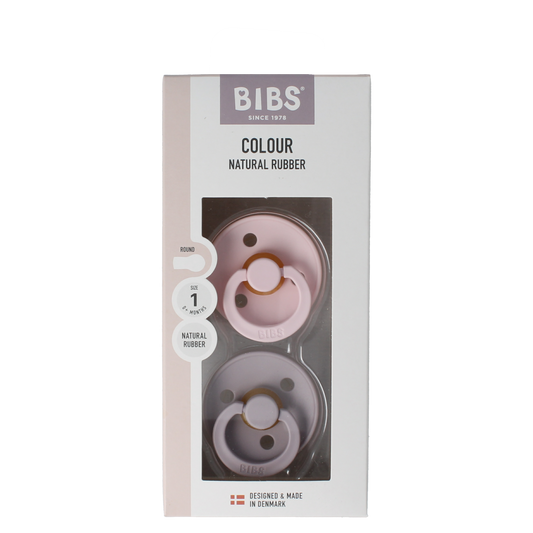 Bibs Fopspeen maat 1 blossom dusky lilac, soft silicone baby pacifier in a natural setting, 2-pack.