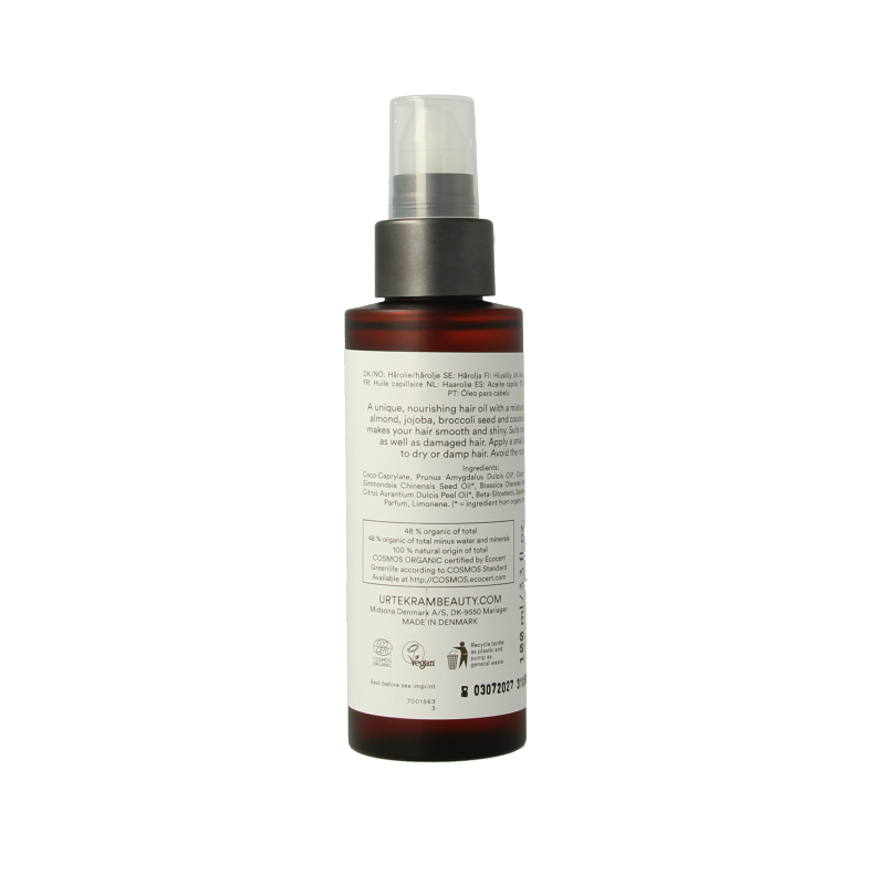Urtekram coconut hair oil in 100ml bottle, natural hair care product with nourishing coconut oil for healthy hair.