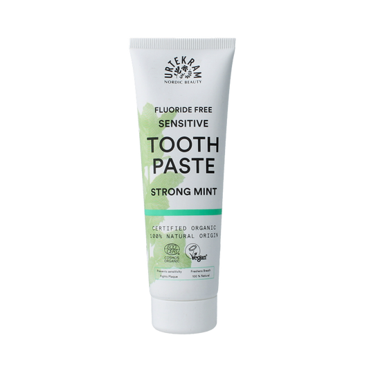 Urtekram sensitive strong mint fluoride-free toothpaste in 75ml tube, showing the packaging with mint flavor branding.