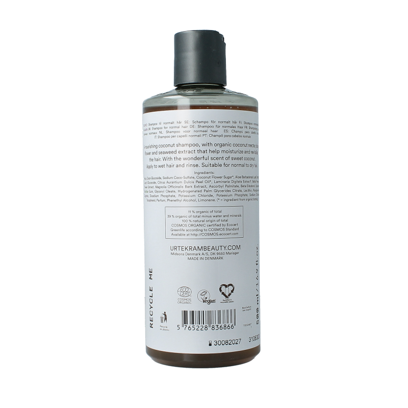 Urtekram kokosnoot shampoo bottle, 500ml, with green label and pump dispenser for natural hair care.