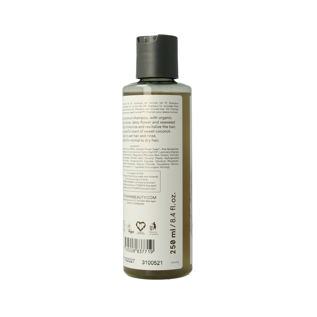 Urtekram kokosnoot shampoo bottle for hair care, 250ml, with a white and green label featuring coconut imagery.