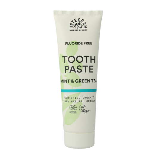Urtekram mint and green tea toothpaste in 75ml tube, natural oral care product with fresh herbal flavor.