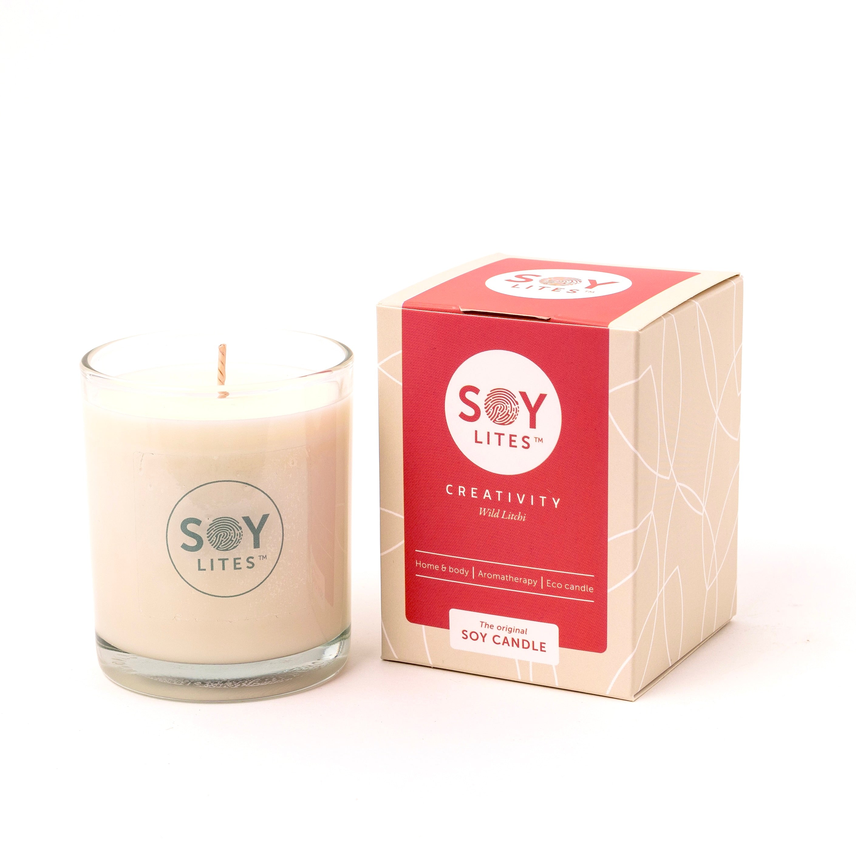 Soylites Soja geurkaars creativity in 70ml glass container with a lit wicks, emitting a warm glow, designed for creating a cozy atmosphere.