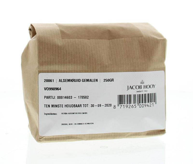 Ground wormwood herb in a jar, Jacob Hooy Alsemkruid 250g, used for cooking and herbal remedies, in a clear container.
