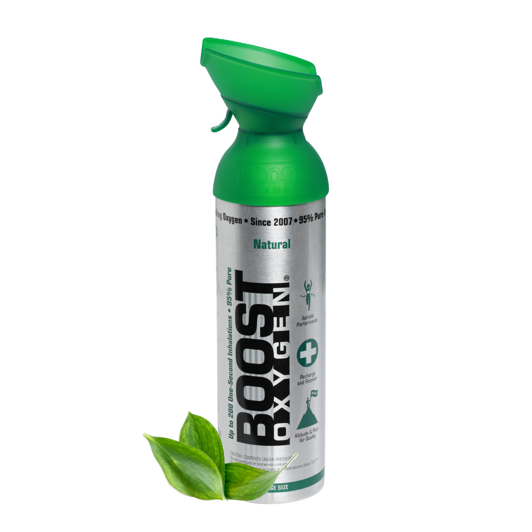 Boost Oxygen Natural 9L canister for breathing support, featuring a compact design and labeled with the Boost Oxygen brand.