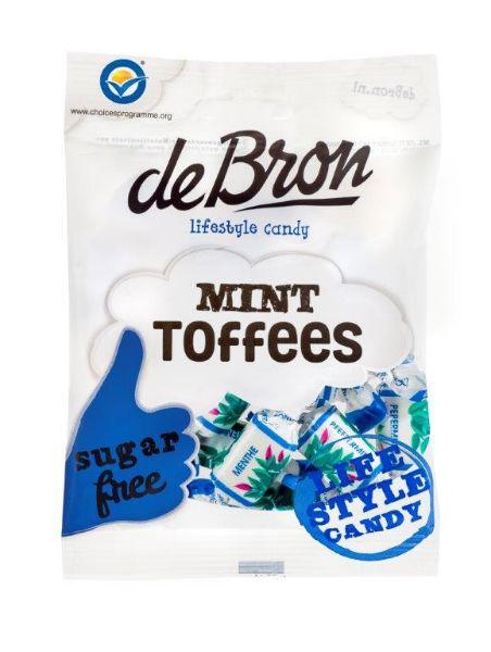 De Bron Mint toffee suikervrij, 90 gram snoepgoed with fresh mint flavor and caramel-colored toffee pieces.