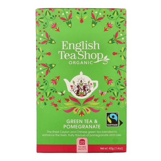 English Tea Shop organic green tea with pomegranate, 20 tea bags, in a colorful box, showcasing fresh tea leaves and pomegranate pieces.