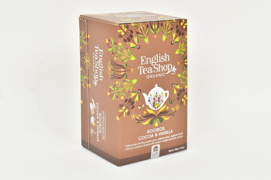English Tea Shop Rooibos cacao vanilla organic tea bags in a box, showcasing the colorful packaging and individual tea sachets.