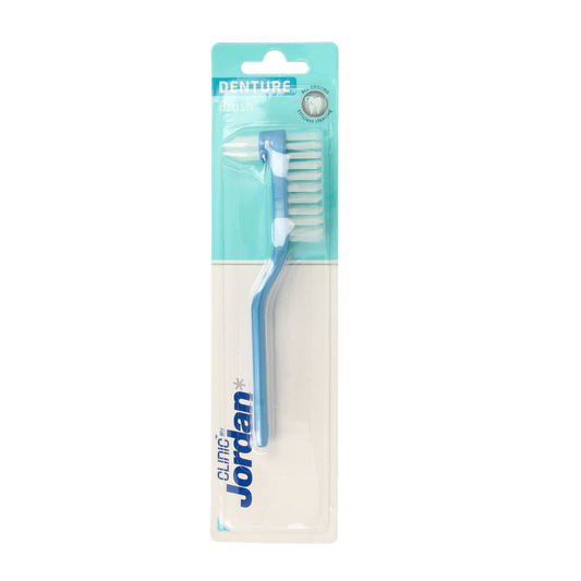 Jordan Protheseborstel 1.00, a dental prosthesis toothbrush for cleaning dentures, with soft bristles and ergonomic handle.