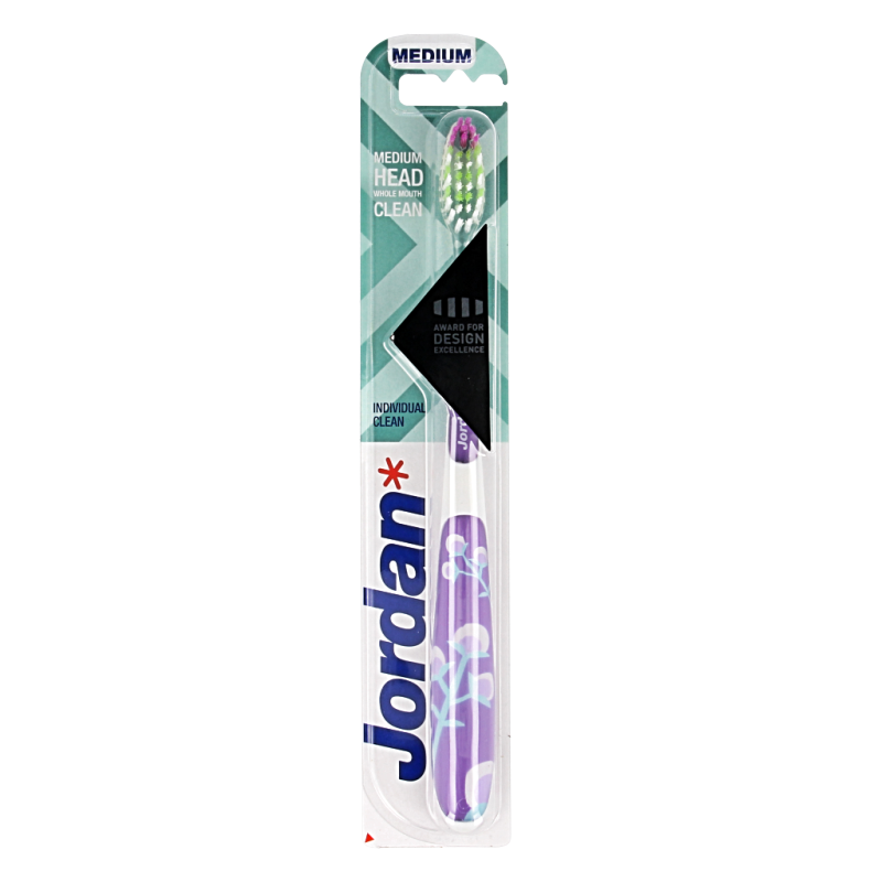Jordan Tandenborstel individual clean medium toothbrush with soft bristles, shown in a close-up image.