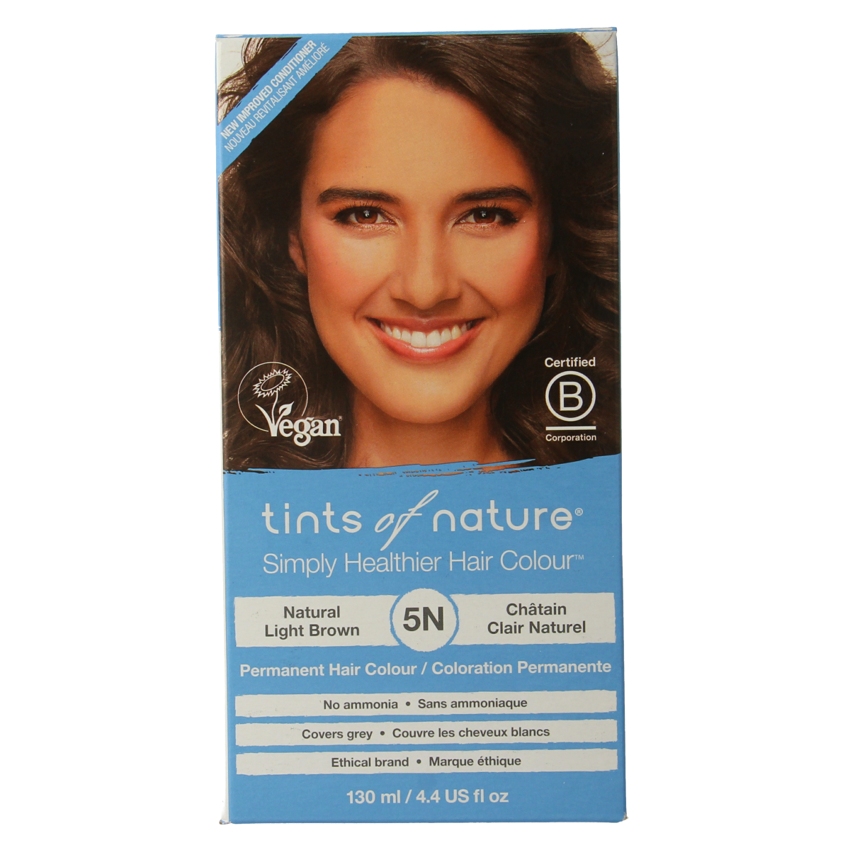 Tints Of Nature 5N light brown hair coloring kit with applicator bottle and gloves for natural-looking hair dye application.