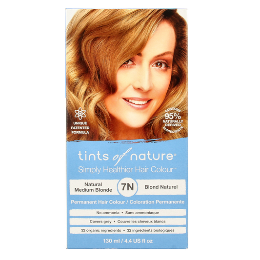 Tints Of Nature 7N medium blonde hair coloring set with natural ingredients, featuring a bottle of hair dye and applicator tools.