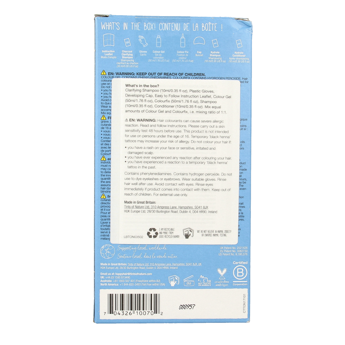 Tints Of Nature 7N medium blonde hair coloring set with natural ingredients, featuring a bottle of hair dye and applicator tools.