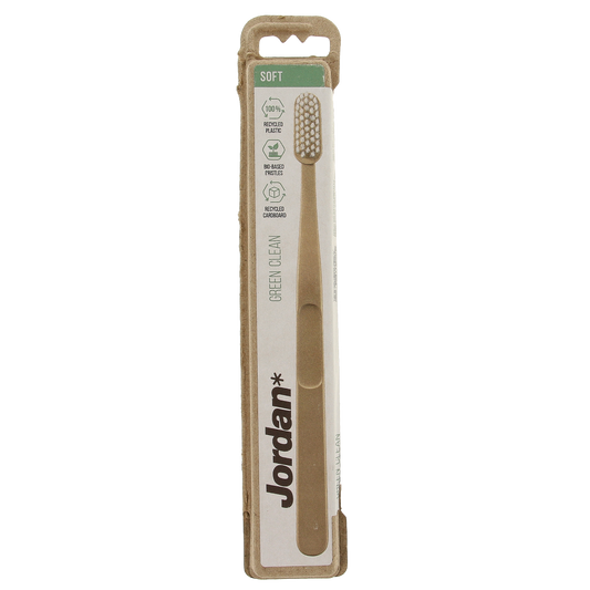 Jordan green soft toothbrush for gentle cleaning, shown with one toothbrush in the image.