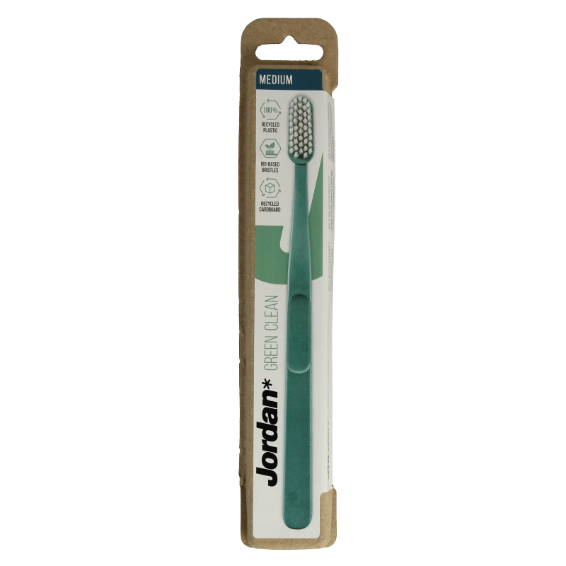 Jordan green clean medium toothbrush for effective oral cleaning, featuring a sturdy handle and soft bristles.