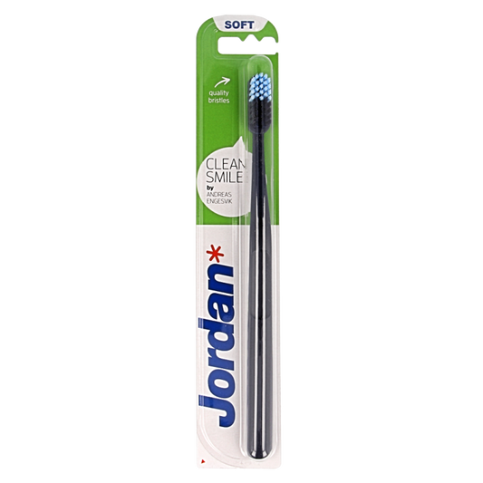 Jordan Clean Smile soft toothbrush, single pack, with white handle and soft bristles for gentle oral care.