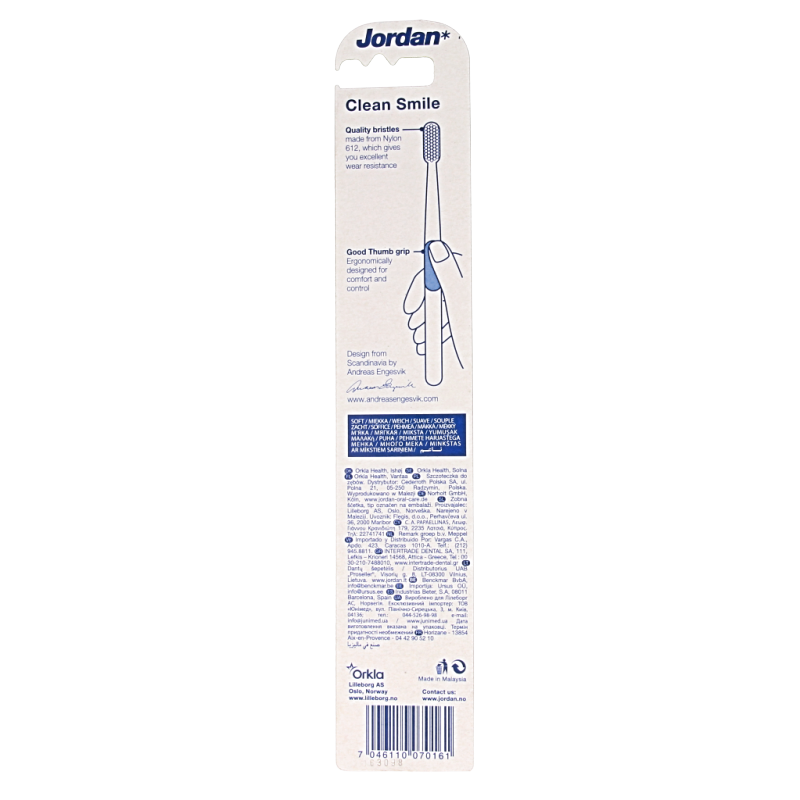 Jordan clean smile soft toothbrush with white and blue bristles, shown in close-up for optimal oral hygiene.