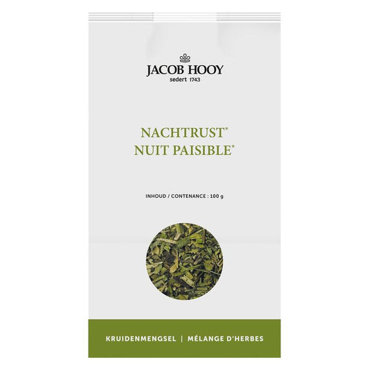 Jacob Hooy Nachtrustkruiden in a 100g package, herbal blend for better sleep, displayed in a clear container on a wooden surface.