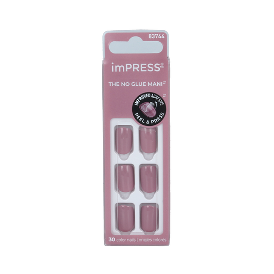 Kiss Impress color petal pink makeup set with lipstick and matching products, featuring a sleek, compact design.