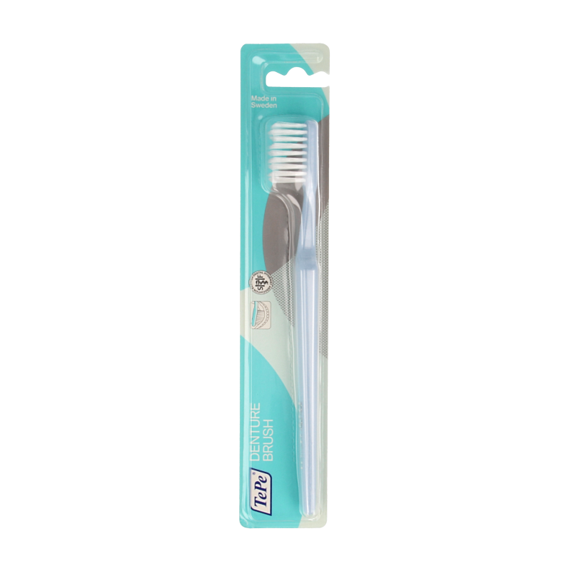 TePe Protheseborstel classic 1.00 prosthesis cleaning brush with a white handle and bristles designed for dental prostheses.