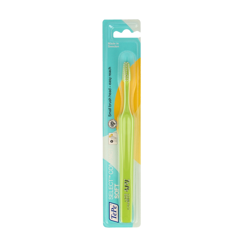TePe Select Compact Soft toothbrush with blue handle, shown with bristles for gentle cleaning, designed for effective oral hygiene.