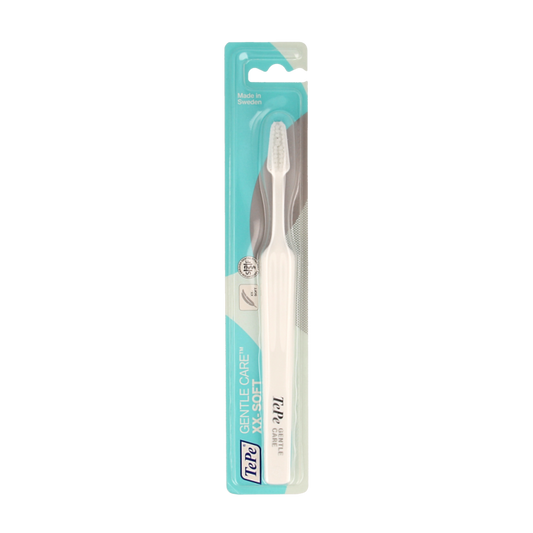 TePe gentle care toothbrush for effective cleaning, shown in a close-up with soft bristles and ergonomic handle design.