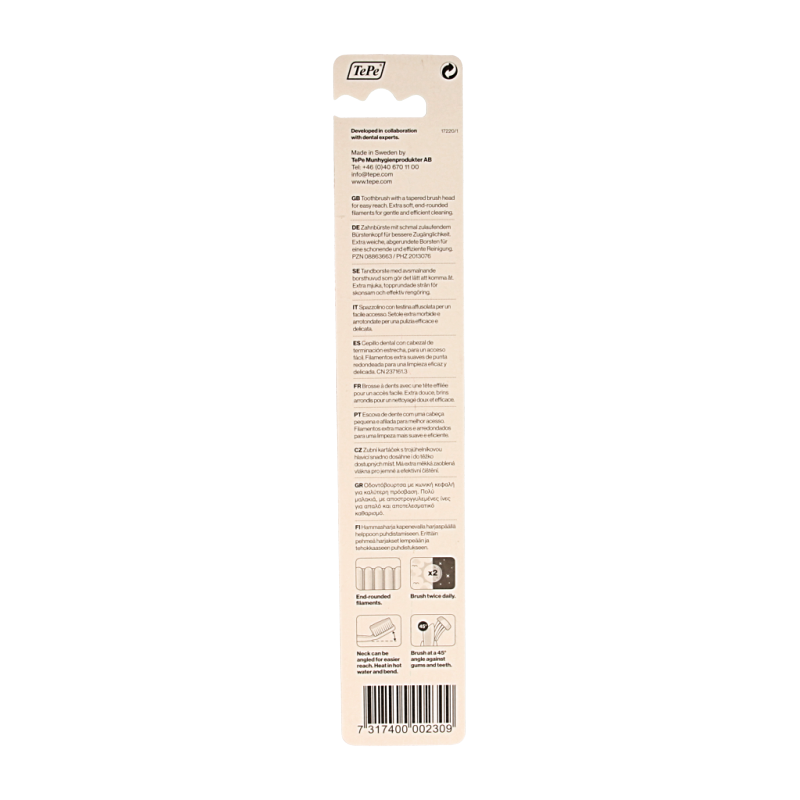 TePe extra soft toothbrush for gentle cleaning, shown in the image with white and blue handle and soft bristles.