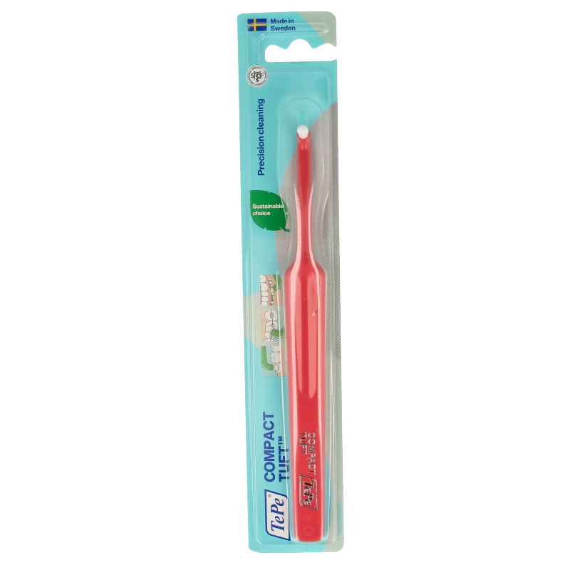 TePe compact tuft toothbrush in white with blue handle, designed for effective cleaning of hard-to-reach areas.