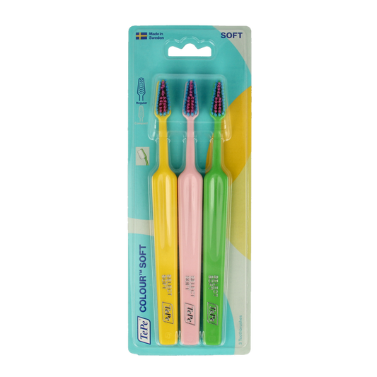 Three TePe soft toothbrushes in a color pack, showing the ergonomic handles and soft bristle heads for gentle cleaning.
