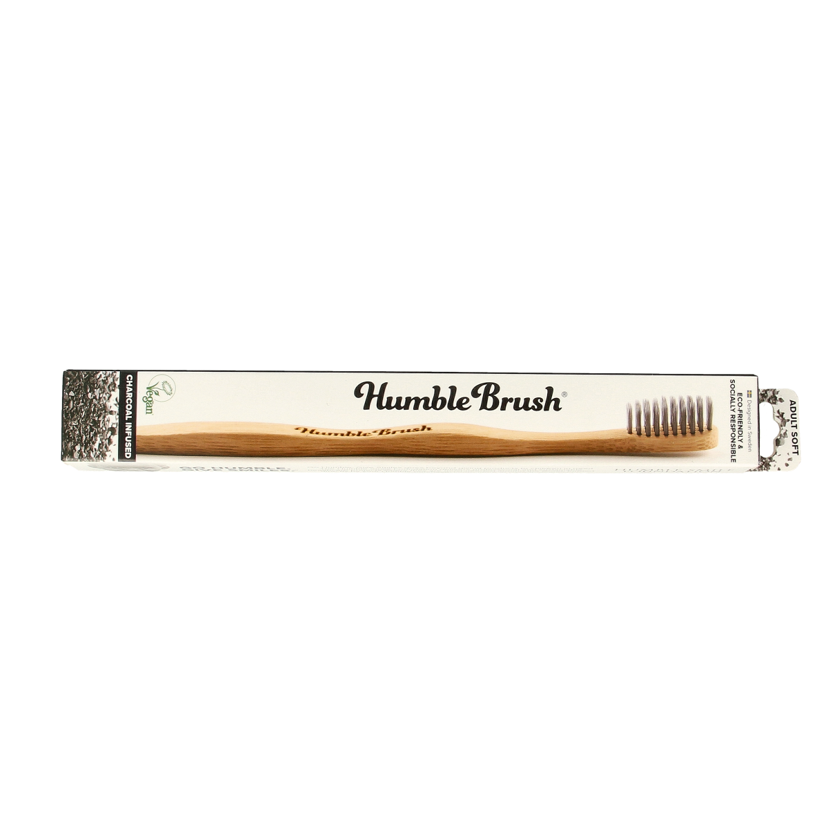 Bamboo charcoal toothbrush by The Humble Co, eco-friendly Tandenborstel with soft bristles, natural wooden handle for oral hygiene.