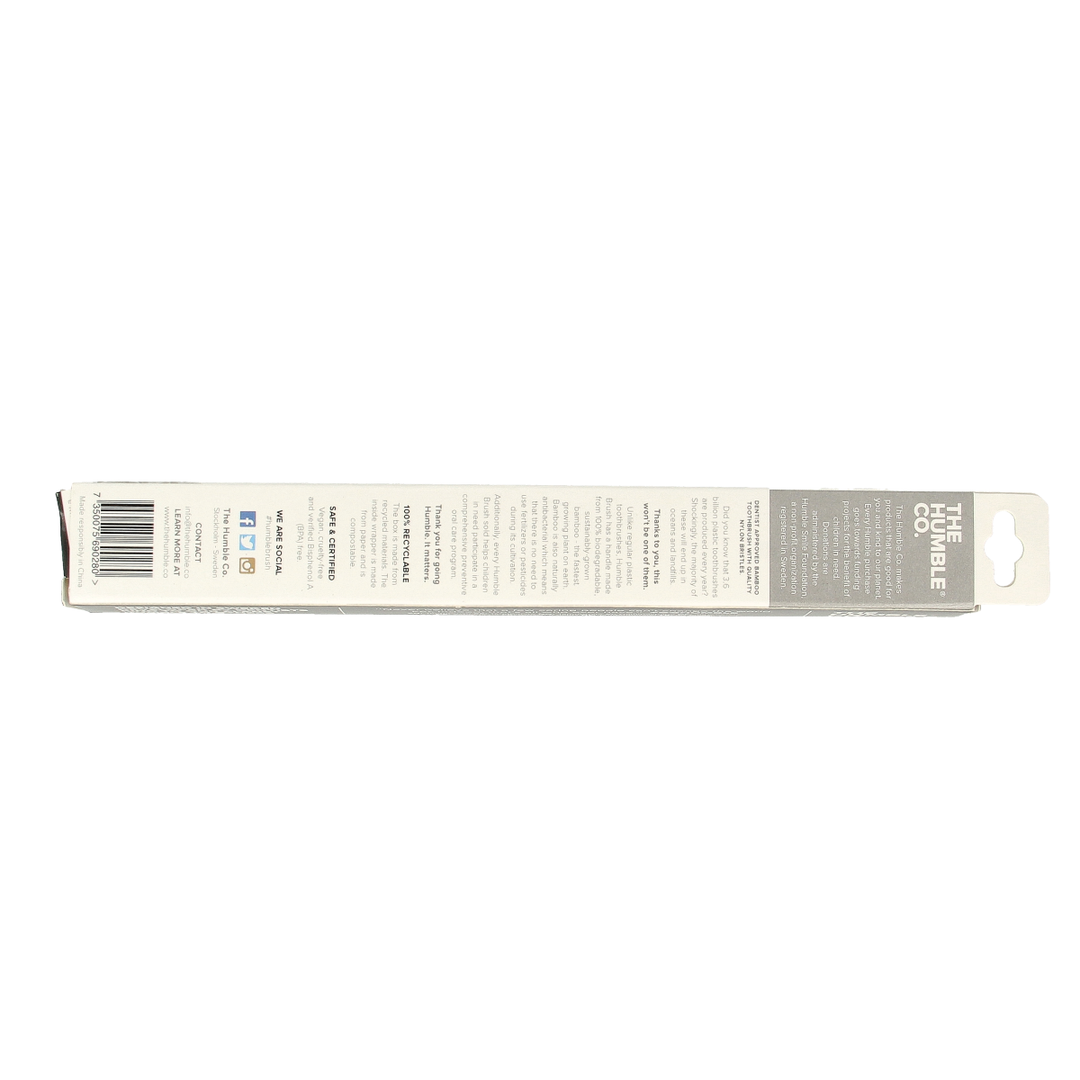 The Humble Co bamboo charcoal toothbrush with natural bamboo handle and black charcoal-infused bristles, eco-friendly dental care tool