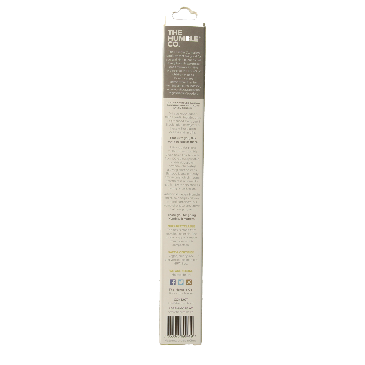 The Humble Co bamboo medium toothbrush in yellow with wooden handle, designed for effective oral cleaning.
