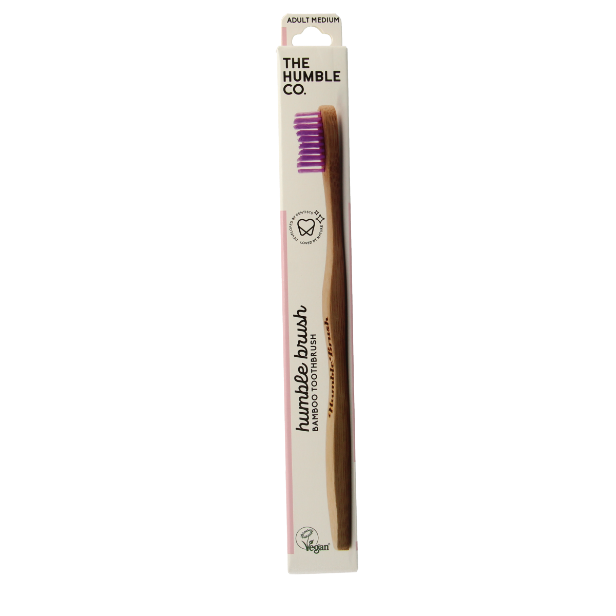 The Humble Co bamboo medium purple toothbrush with biodegradable handle and soft bristles, designed for eco-friendly oral care.