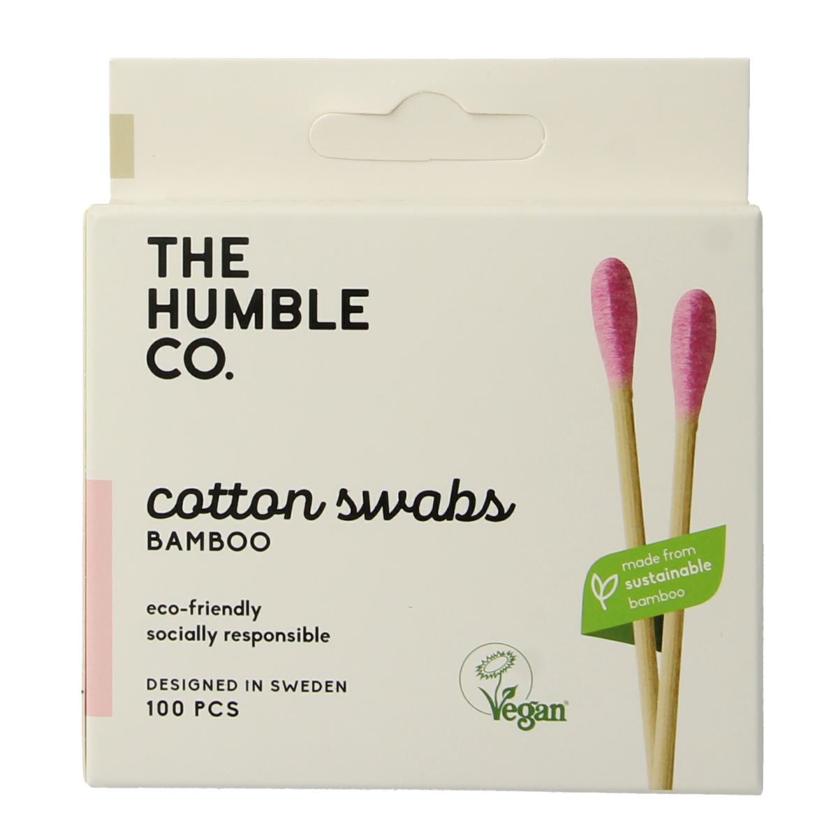 Pair of purple bamboo cotton swabs from The Humble Co for ear care, shown in close-up with packaging in the background.