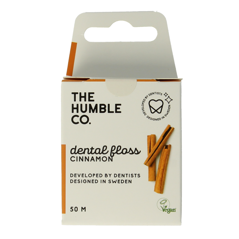 The Humble Co cinnamon dental floss 50 meters shown in a clear plastic package, designed for oral hygiene and flossing.