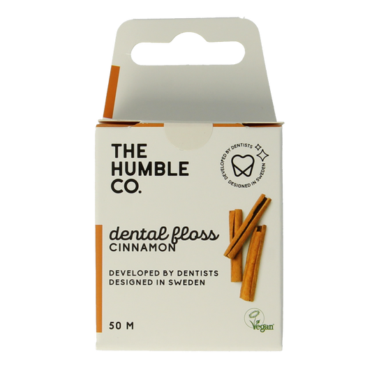 The Humble Co cinnamon dental floss 50 meters, shown unspooled, designed for oral hygiene and dental care.