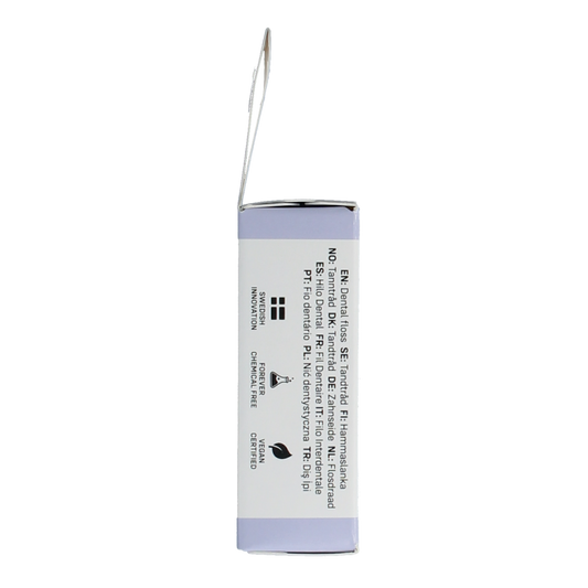 The Humble Co charcoal dental floss for oral hygiene, displayed in its packaging with black and white design elements.
