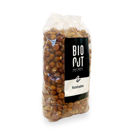 Bionut organic hazelnuts in a 1kg package, raw superfood nuts with natural brown shells and textured surface.