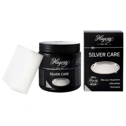 Hagerty Silver Care 185g silver cleaning paste in a metal tin, designed for polishing and maintaining silver jewelry and tableware.