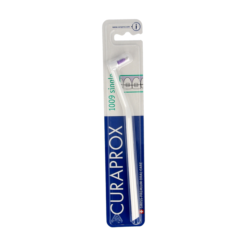 Curaprox CS 1009 single toothbrush in assorted colors, soft bristles, ideal for gentle and effective oral cleaning.