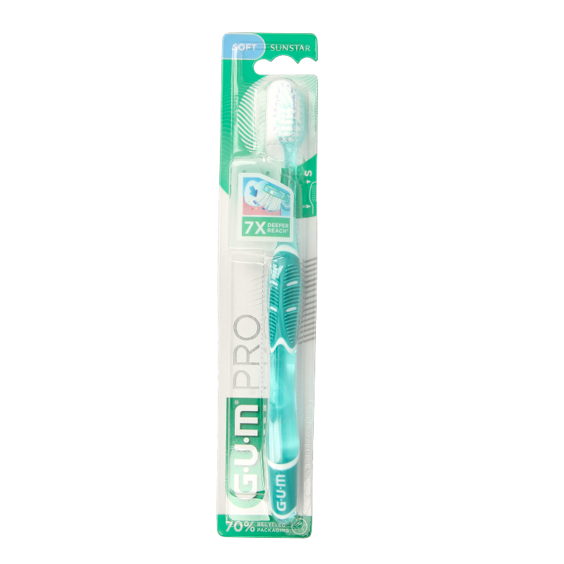 GUM Technique Pro Soft toothbrush showing soft bristles and ergonomic handle for effective gentle cleaning.