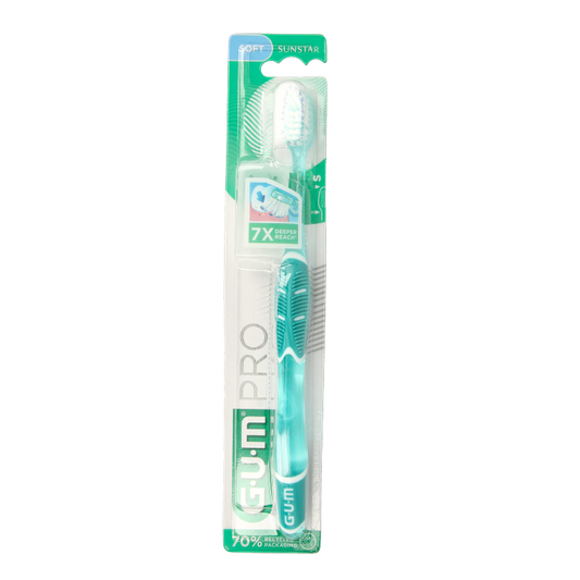 GUM Technique Pro Soft toothbrush showing soft bristles and ergonomic handle for effective gentle cleaning.