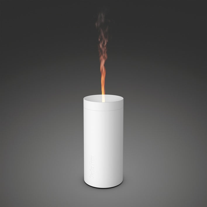 Stadler Lucy white diffuser for fragrance, with a sleek design, shown in a close-up image.