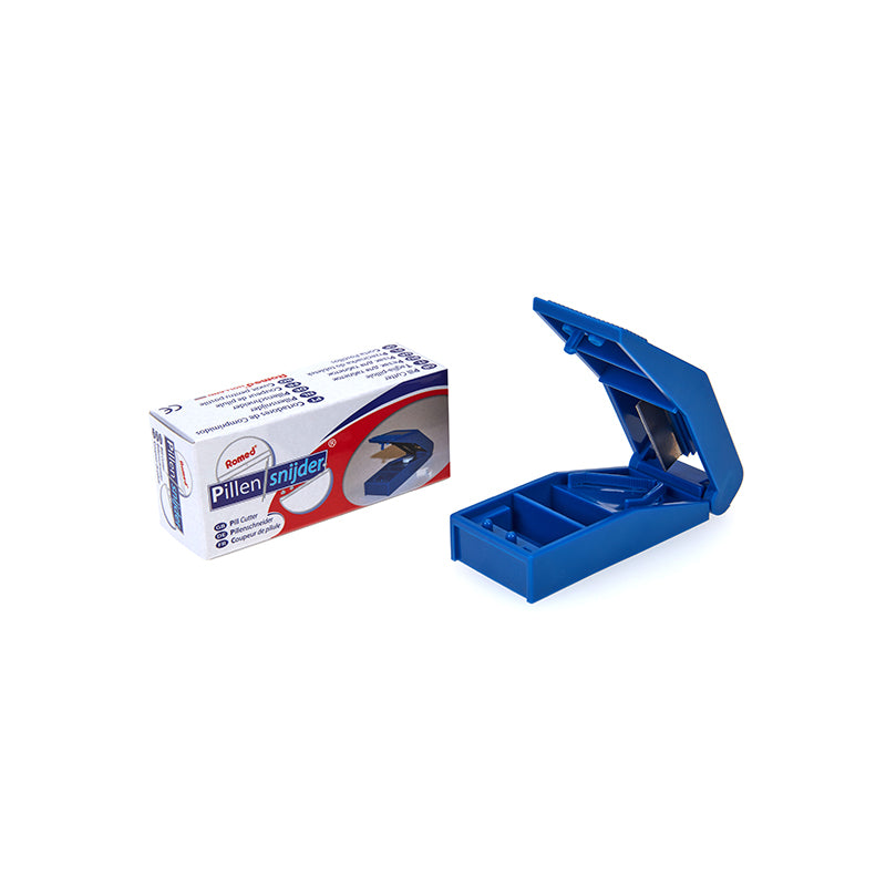 Romed pill cutter instrument with stainless steel blade and plastic handle, used for precise pill splitting.